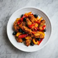 Straccetti di Pollo con Peperoni e Olive Nere in 25 Minuti
